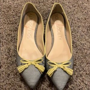 Black and white striped flats